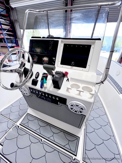 Key West boat, Captain's Helm Garmin GPS, Fusion remote, Custom Acrylic Dash