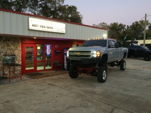 Chevy 3500 with 18 inch lift, Road Armor bumpers, Recon headlights, and our LED package