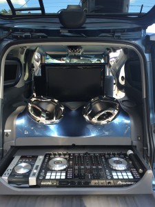 Mobile DJ station installed in a Honda Element, complete with Mmats Pro Audio and accented by RGB LEDs
