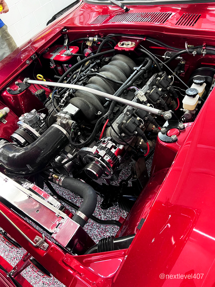 Red Datsun Car engine, Next Level Orlando