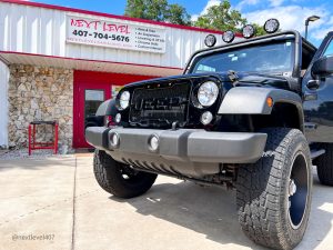 Jeep Wrangler Doors open Custom Hardware and Lighting Installed and Fabricated at Next Level Orlando
