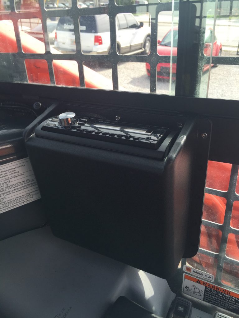 Radio and Speakers Installed In Kubota Skid Steer Orlando Custom Audio