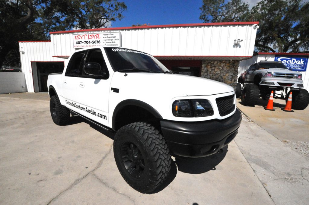 truck customization install lifted tires