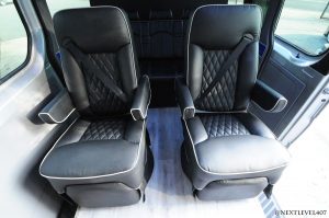 Leather captain chairs installed in Mercedes Sprinter Van
