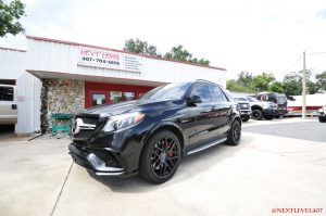 Front-Low-Driver-Side-Black-Rims-Profile-Store-Front-Next-Level-Custom-Black-Mercedes-GLE-63-AMG