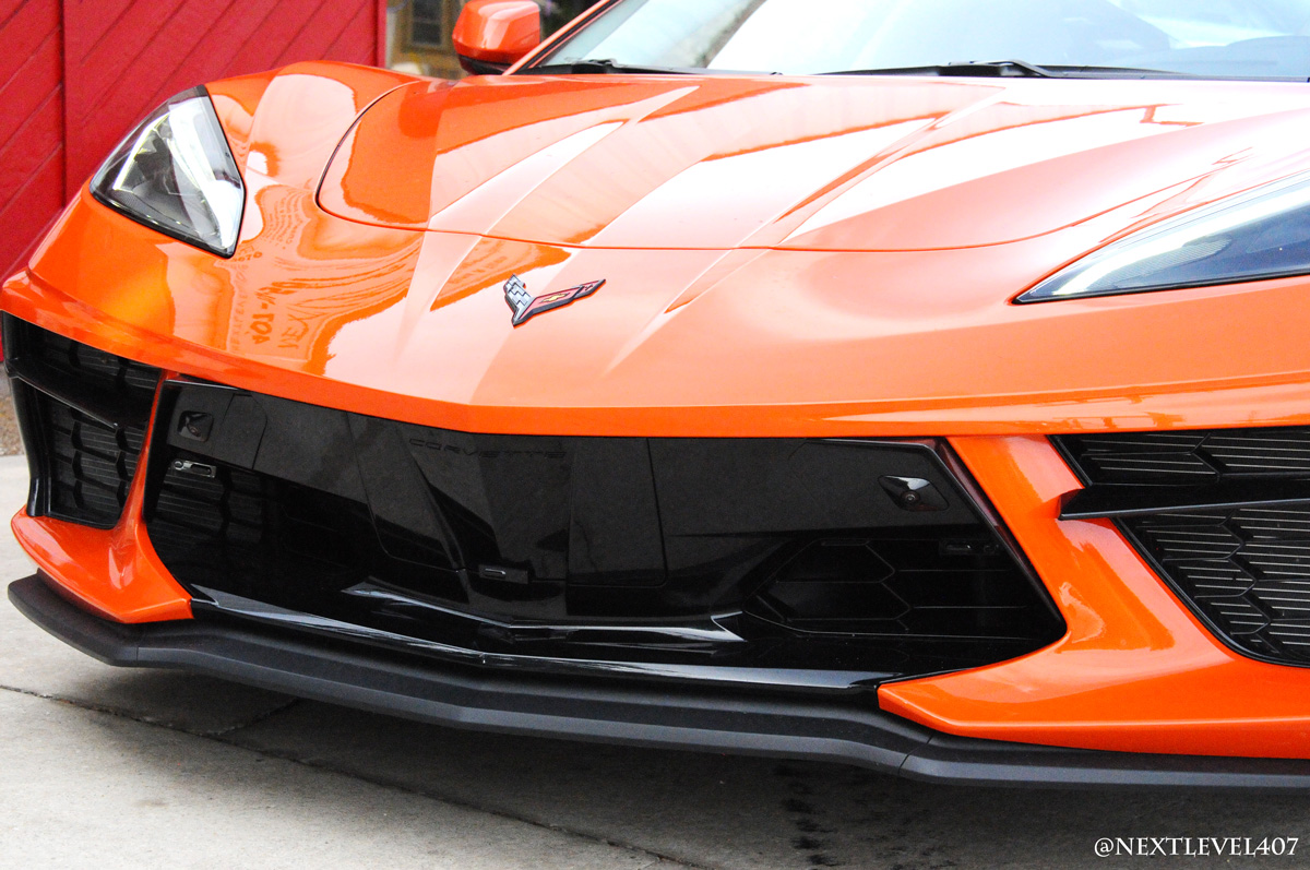 Orange-Corvette-K40-Speed-Trap-Sensor-Custom-Install-Next-Level-Front-Bumper-Store-Front-Bumper-Close-Up-Laser-Sensor-Custom-Install-Profile