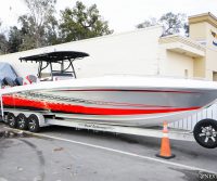 Red-Renegade-Boat-2-Sea-Dek-Marine-Flooring-Pad-Customized-Red-With-LogoDriver-Side-Acrylic-Dash-Radio-Garmin-Moniter-Back-Seats-Mulligan-Logo-Full-Profile