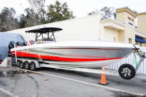 Red-Renegade-Boat-2-Sea-Dek-Marine-Flooring-Pad-Customized-Red-With-LogoDriver-Side-Acrylic-Dash-Radio-Garmin-Moniter-Back-Seats-Mulligan-Logo-Full-Profile