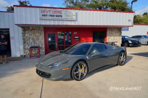 Ferrari 458 Spider upgraded with custom speakers and subwoofers by Next Level Orlando Custom Audio.