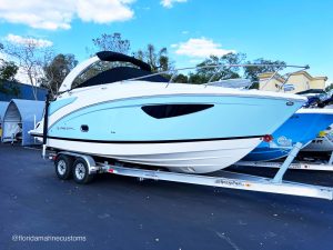 Florida Marine Customs shows a boat with custom audio.