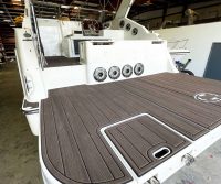 Next Level Orlando shows a Maxum boat installed with woodgrain SeaDek.