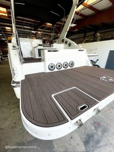 Next Level Orlando shows a Maxum boat installed with woodgrain SeaDek.