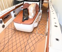 Next Level Orlando shows the deck and seating of an Invincible brand boat upgraded with SeaDek.