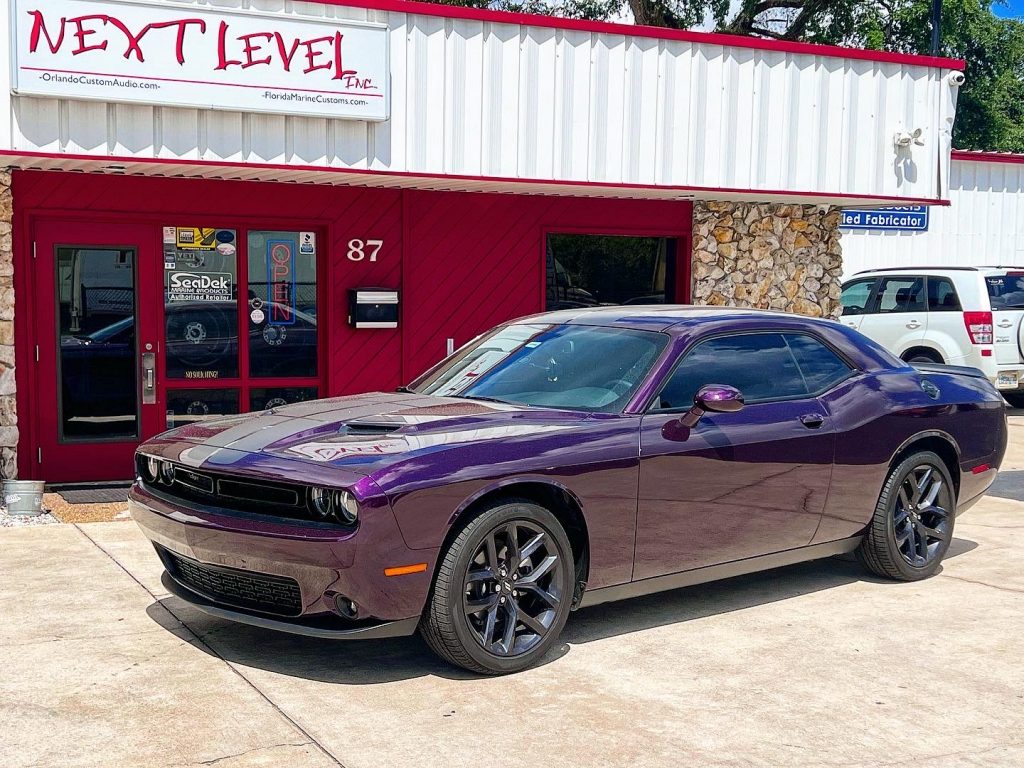 Challenger Featured photo. Challenger. Feature photo. Subwoofer upgrade. Feature photo. Next level in background. Next Level Customs. Next Level Inc. Orlando Custom Audio.