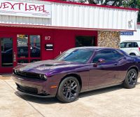 Challenger Featured photo. Challenger. Feature photo. Subwoofer upgrade. Feature photo. Next level in background. Next Level Customs. Next Level Inc. Orlando Custom Audio.