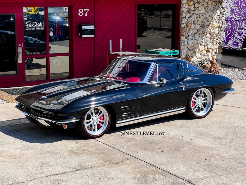 Corvette Stingray, photo of car in front of shop 2.