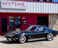 Corvette Sting Ray in front of shop. Next Level Customs. Next Level Inc. Orlando Custom Audio.