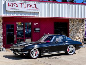 Corvette Sting Ray in front of shop. Next Level Customs. Next Level Inc. Orlando Custom Audio.