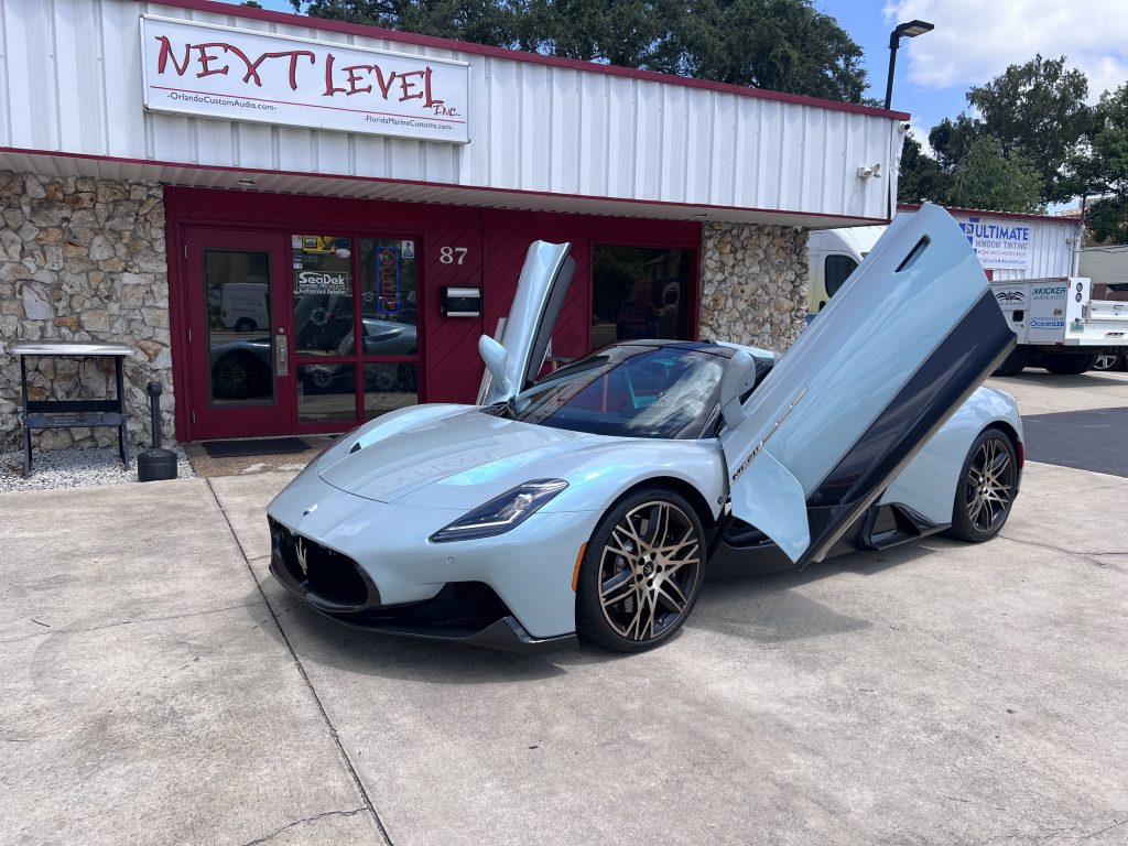 Maserati, doors open in front of NextLevel. ReEdited.