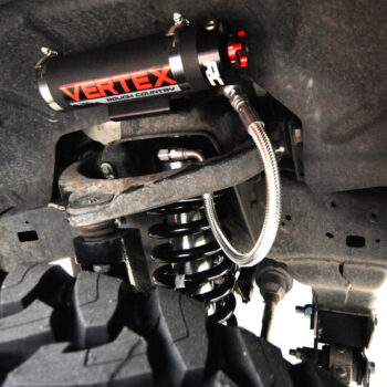 Next Level Silver Dodge Ram Vertex Rough County Suspension and Toyo Open Country Tire Install Orlando