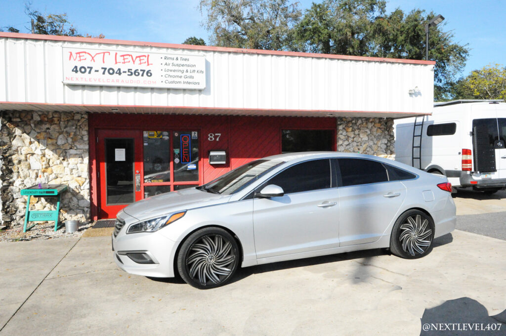 Next Level Silver Hyundai Sonata Upgraded with Alpine Halo Touchscreen Amps Custom Speaker Install Orlando