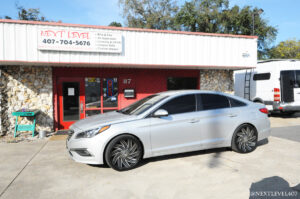 Next Level Silver Hyundai Sonata Upgraded with Alpine Halo Touchscreen Amps Custom Speaker Install Orlando