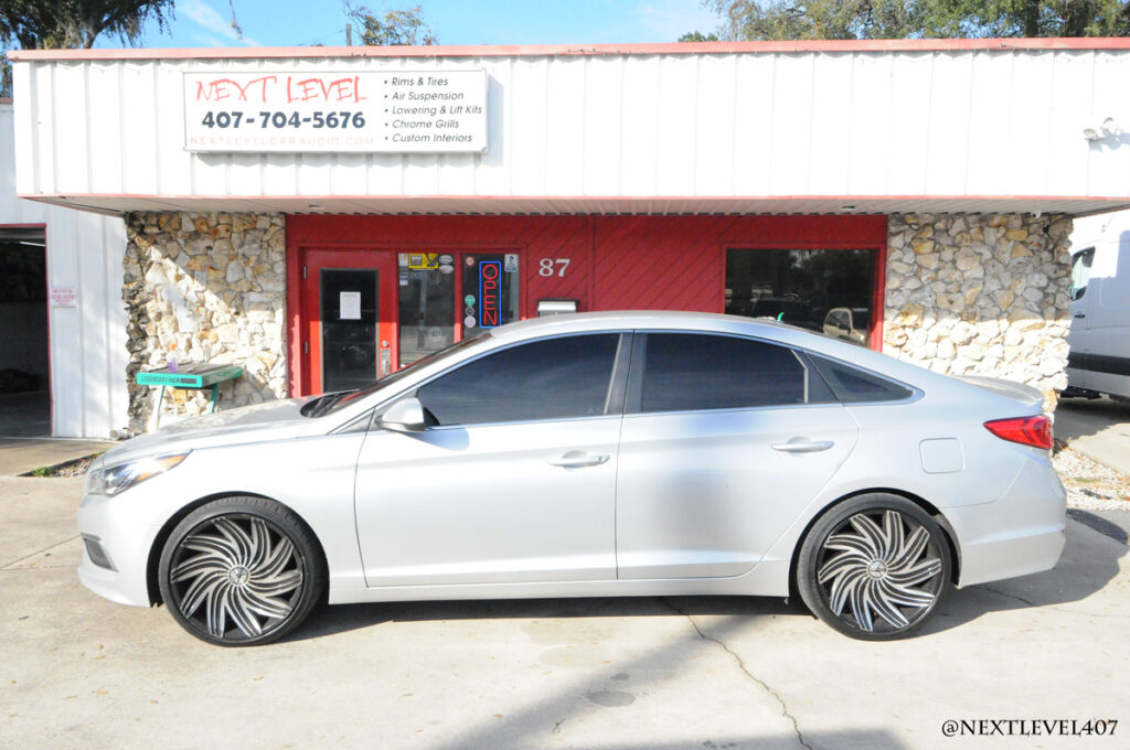 Next Level Silver Hyundai Sonata Upgraded with Alpine Halo Touchscreen Amps Custom Speaker Install Orlando Side View